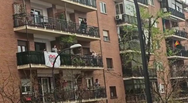 Rocío’s neighbors clap and sing along to her song.